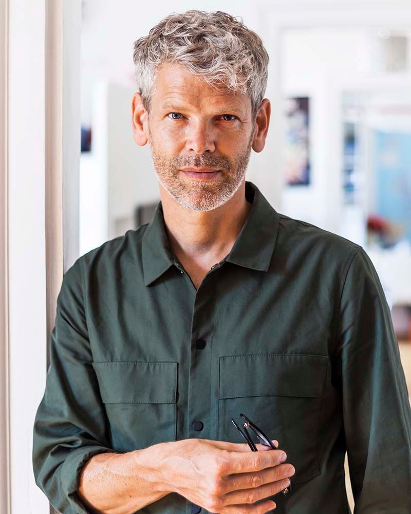 portrait-of-mature-man-with-grey-hair-and-stubble-N2FETGY.jpg
